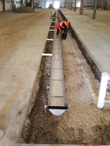 Last section of trench drain ready for backfill